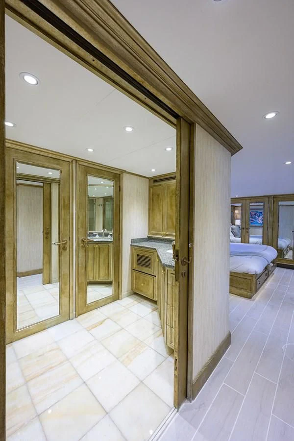 a bathroom with a large mirror aboard OCEAN DRIVE Yacht for Sale