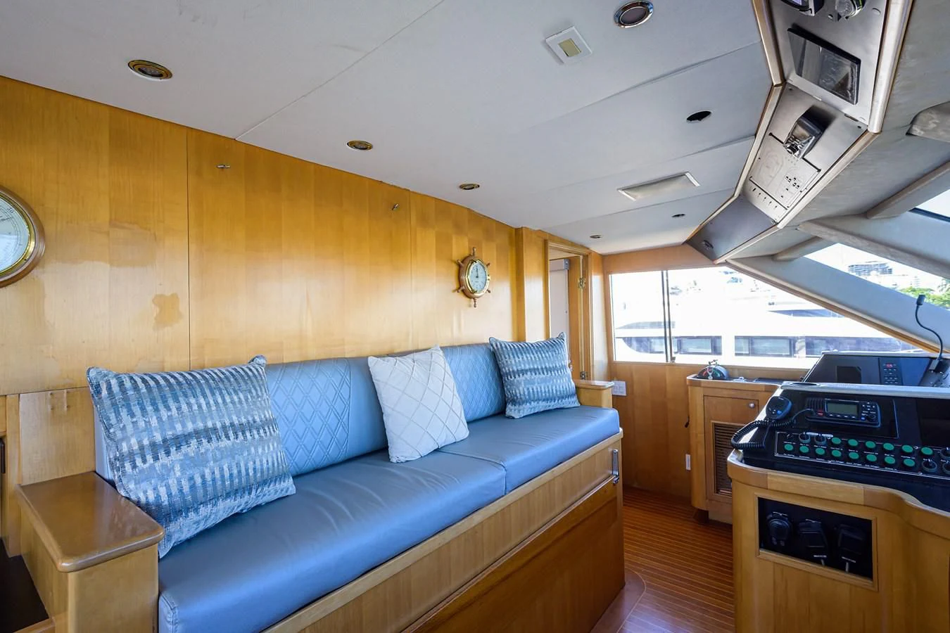 a living room with a couch and a stove aboard OCEAN DRIVE Yacht for Sale