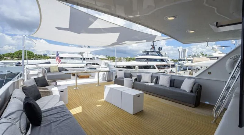 a large living room with a large ship in the water aboard OCEAN DRIVE Yacht for Sale