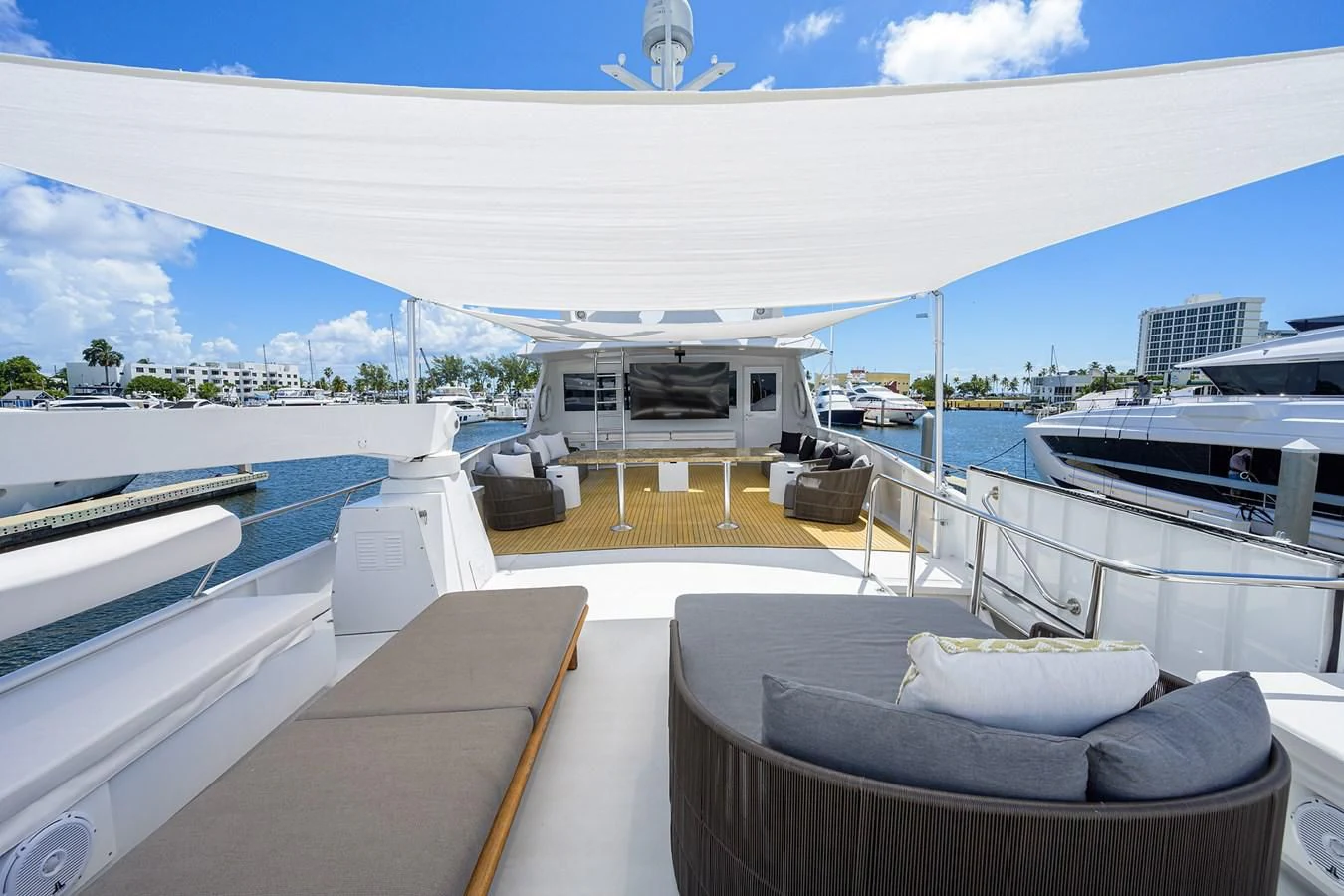 a room with a view of the ocean and a large building aboard OCEAN DRIVE Yacht for Sale