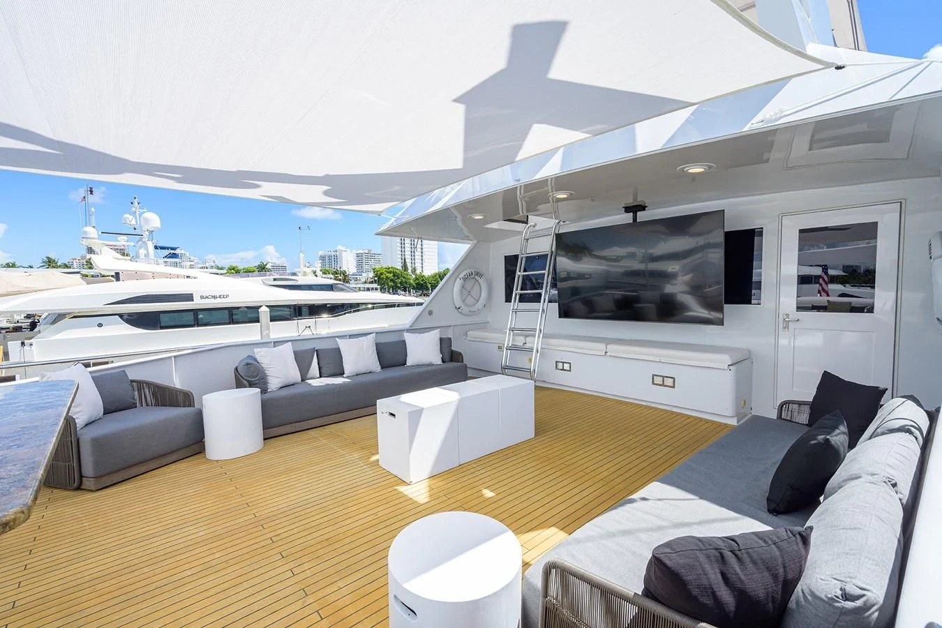a living room with a large window aboard OCEAN DRIVE Yacht for Sale
