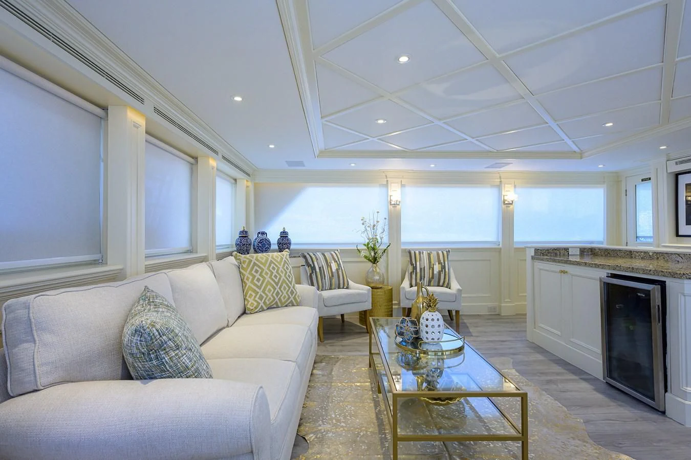 a living room with a fireplace aboard OCEAN DRIVE Yacht for Sale
