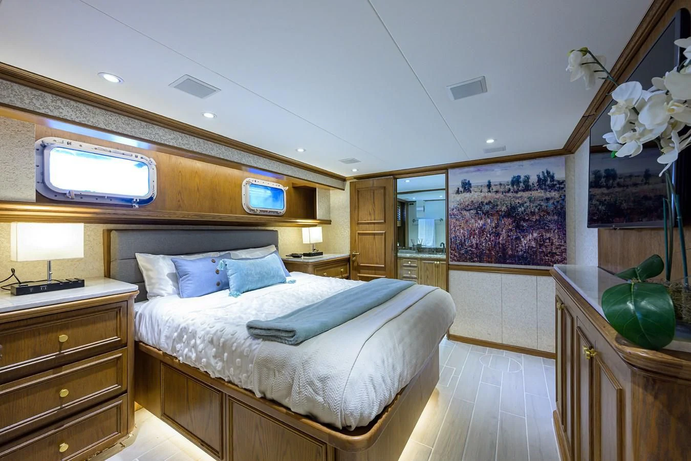 a bedroom with a large bed aboard OCEAN DRIVE Yacht for Sale