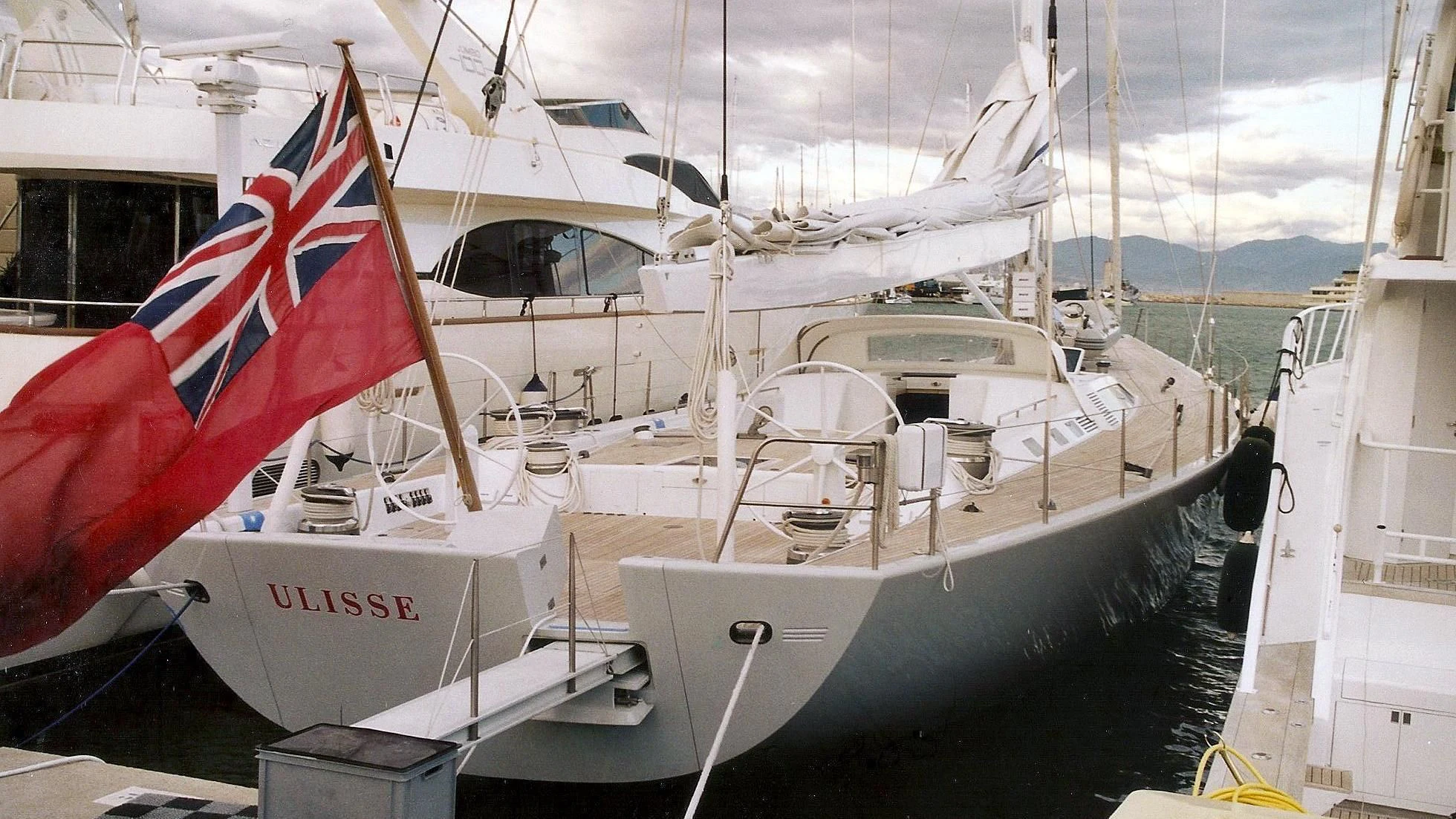 a couple of boats in a harbor aboard ULISSE Yacht for Sale
