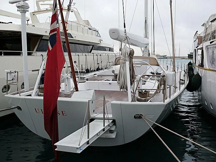 a boat with a flag on it aboard ULISSE Yacht for Sale