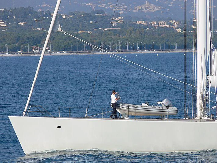 a man standing on a boat aboard ULISSE Yacht for Sale