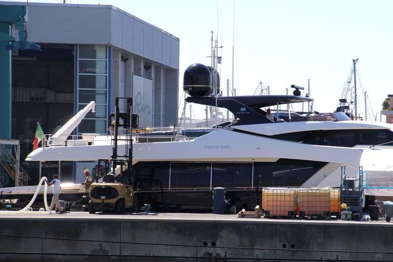 a boat is parked in a harbor aboard PANTA RHEI Yacht for Sale