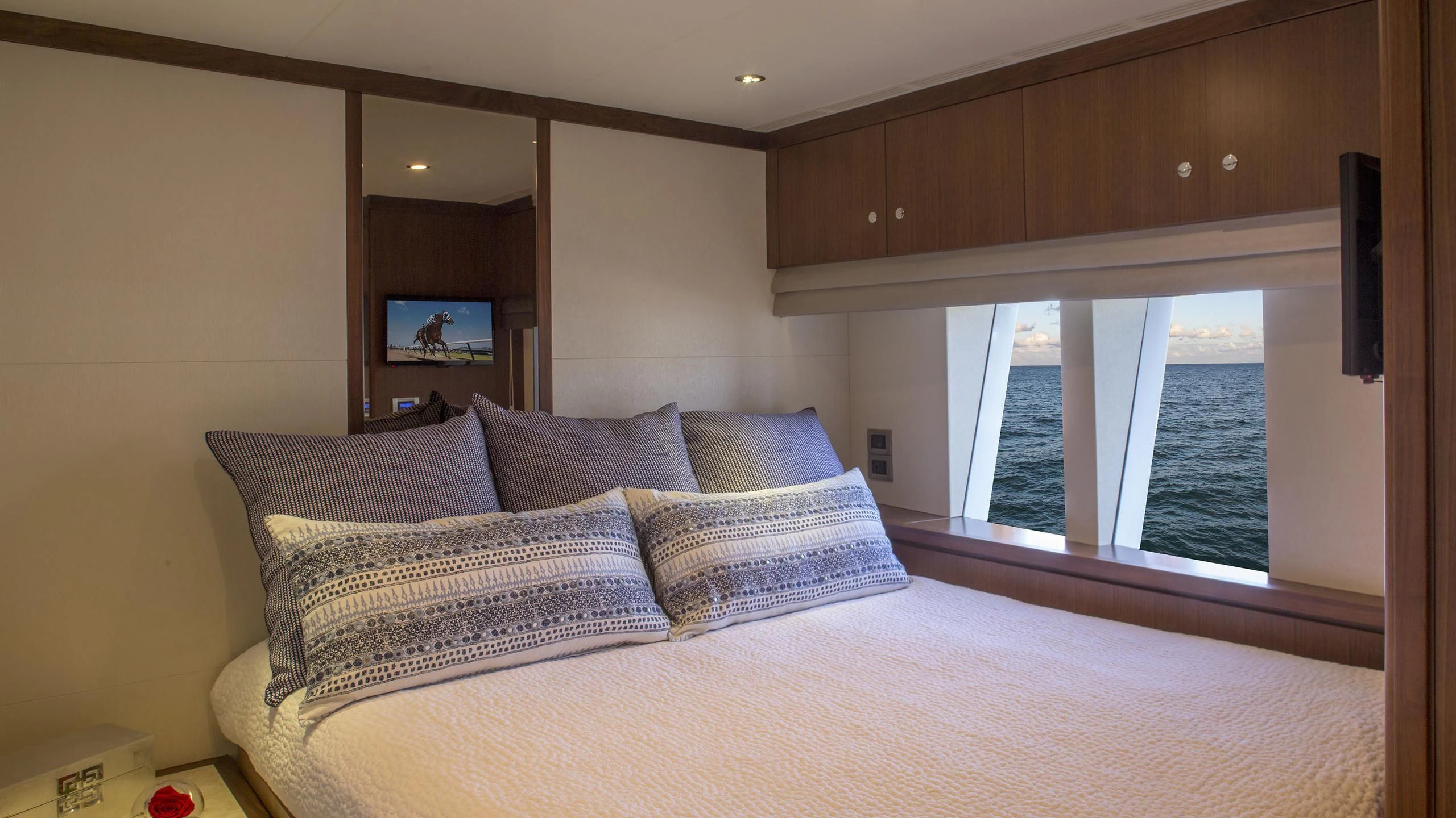 a bed with pillows aboard TOSCA Yacht for Sale