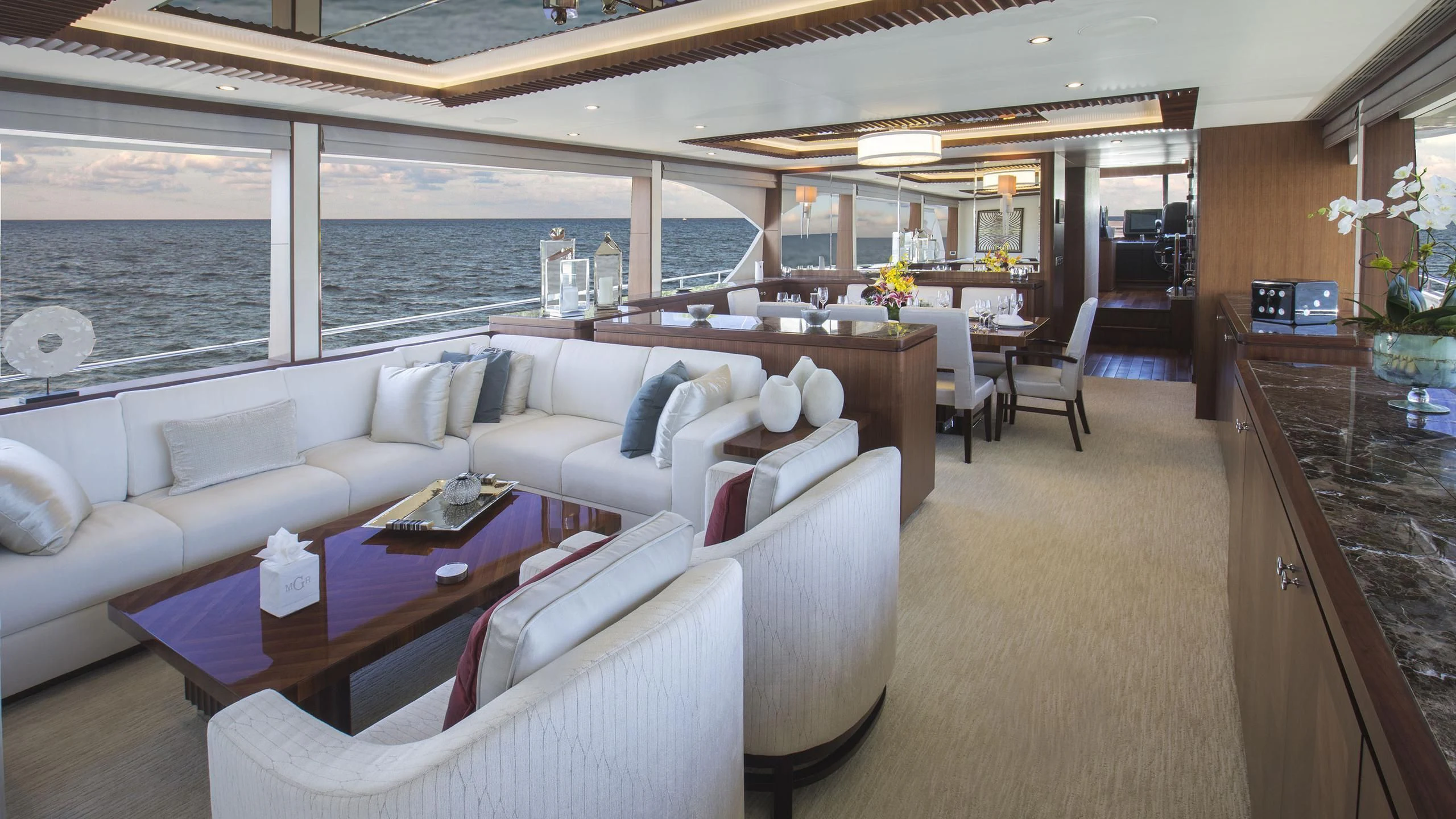 a living room with a large window aboard TOSCA Yacht for Sale