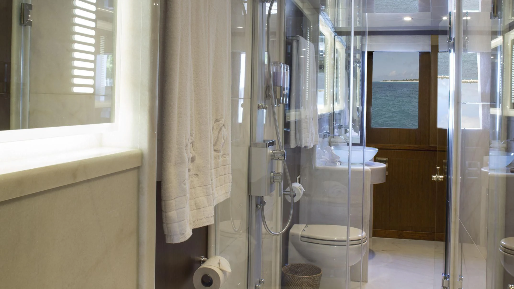 a bathroom with a toilet and sink aboard TOSCA Yacht for Sale