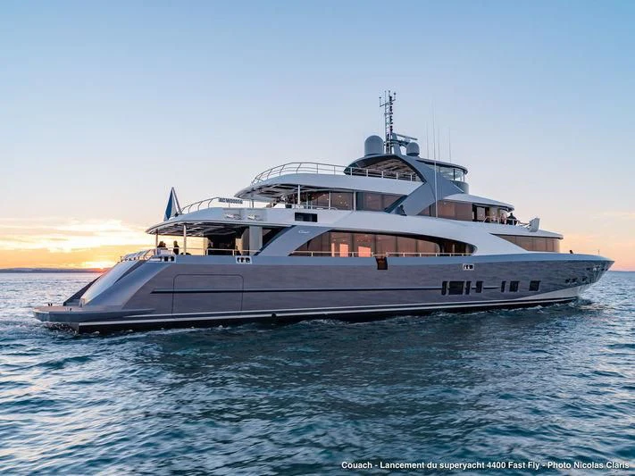 a large boat in the water aboard TOSCA Yacht for Sale