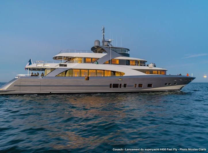 a large ship in the water aboard TOSCA Yacht for Sale