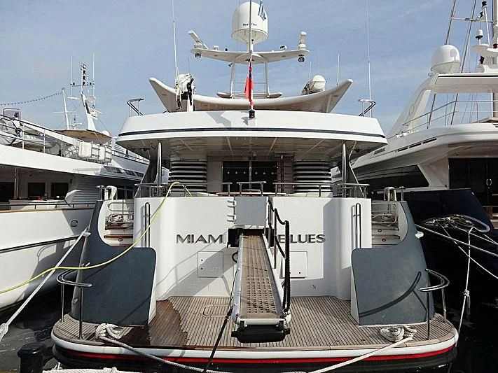 a large white boat with a satellite dish on it aboard WOLFOZ Yacht for Sale