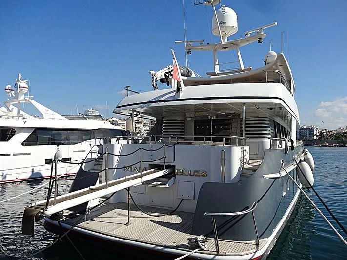 a boat docked at a pier aboard WOLFOZ Yacht for Sale