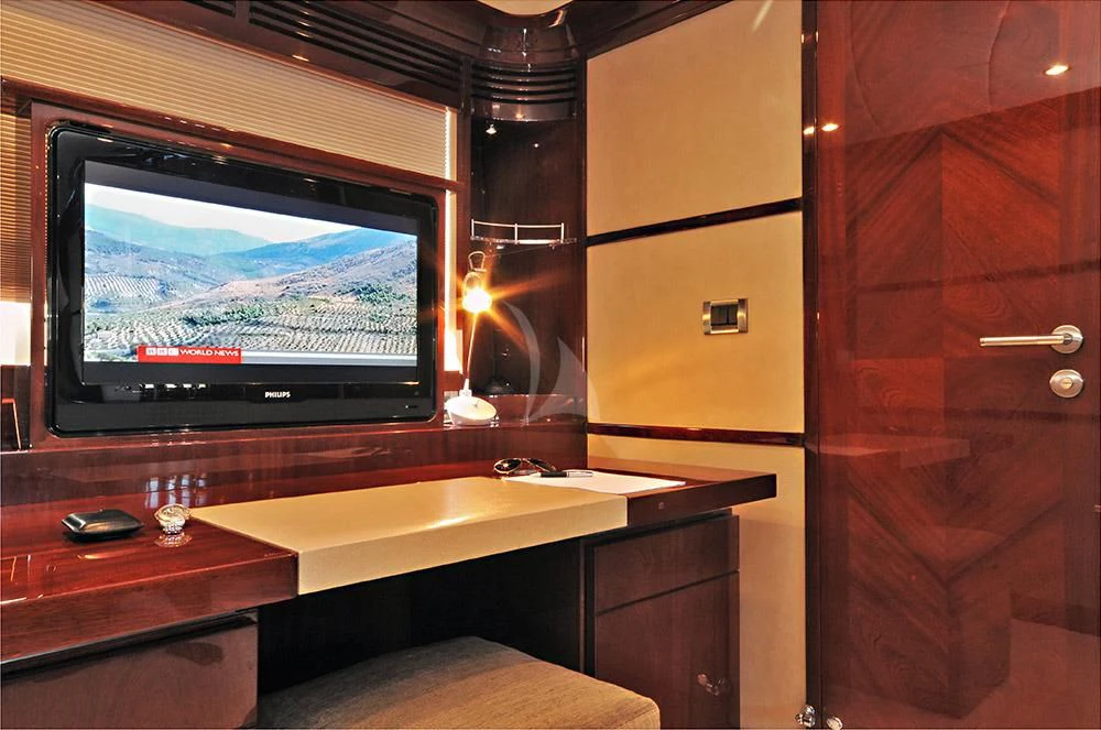 a tv on a counter aboard LADY CAROLA Yacht for Sale