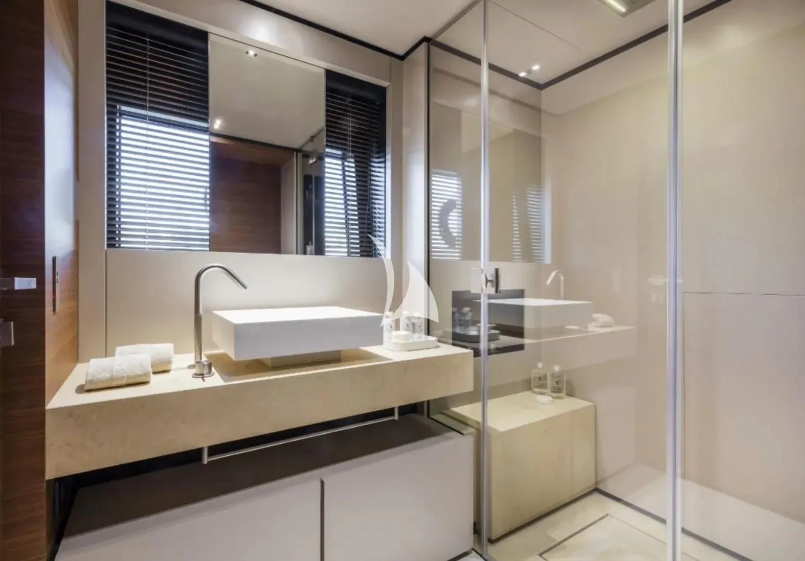 a bathroom with a sink and a mirror aboard NINETEEN Yacht for Sale