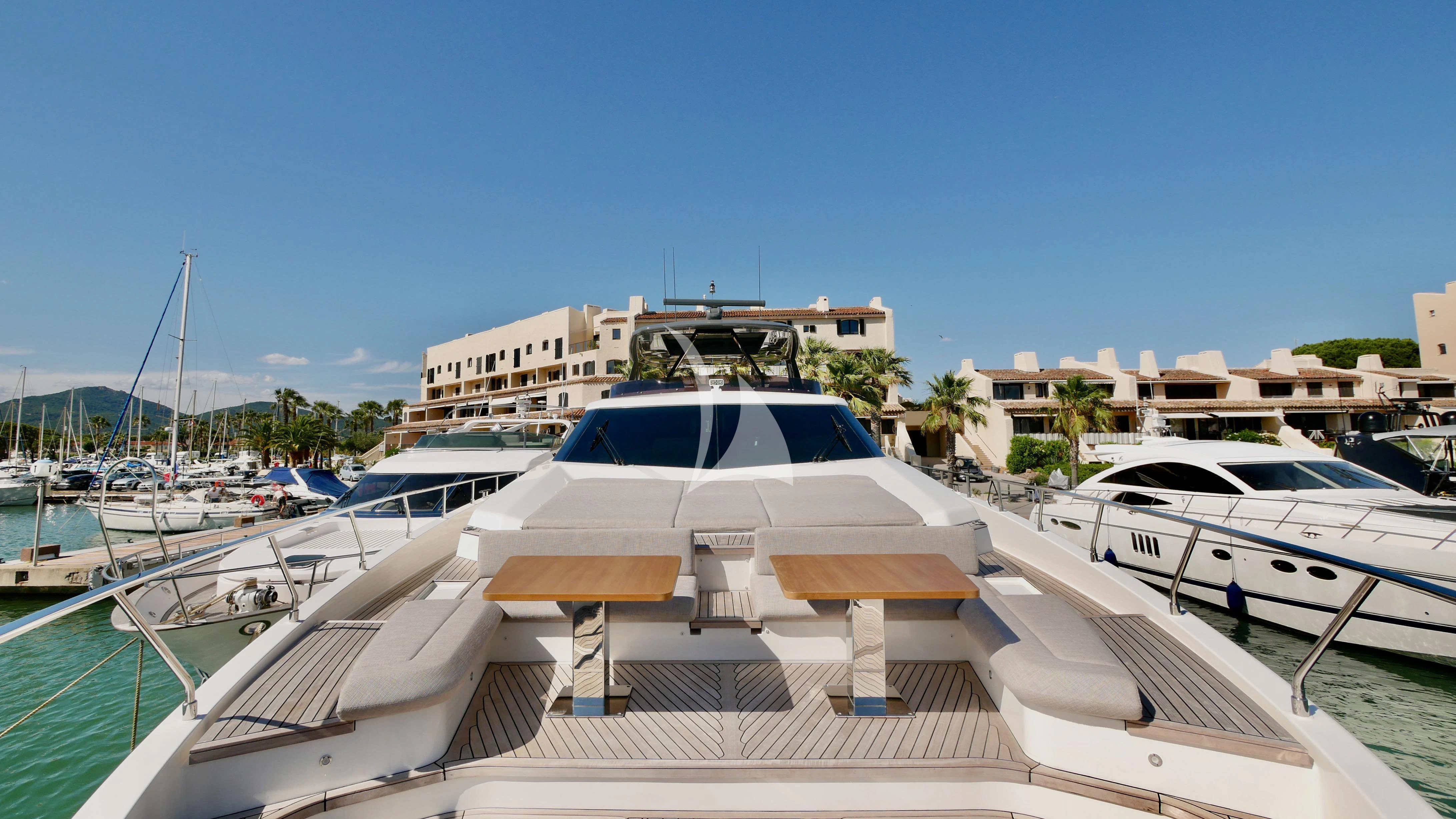a group of boats are parked in a harbor aboard NINETEEN Yacht for Sale