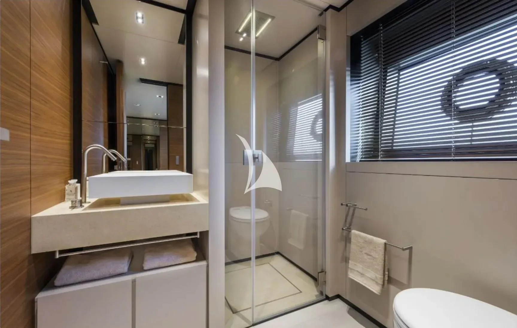 a bathroom with a glass shower aboard NINETEEN Yacht for Sale