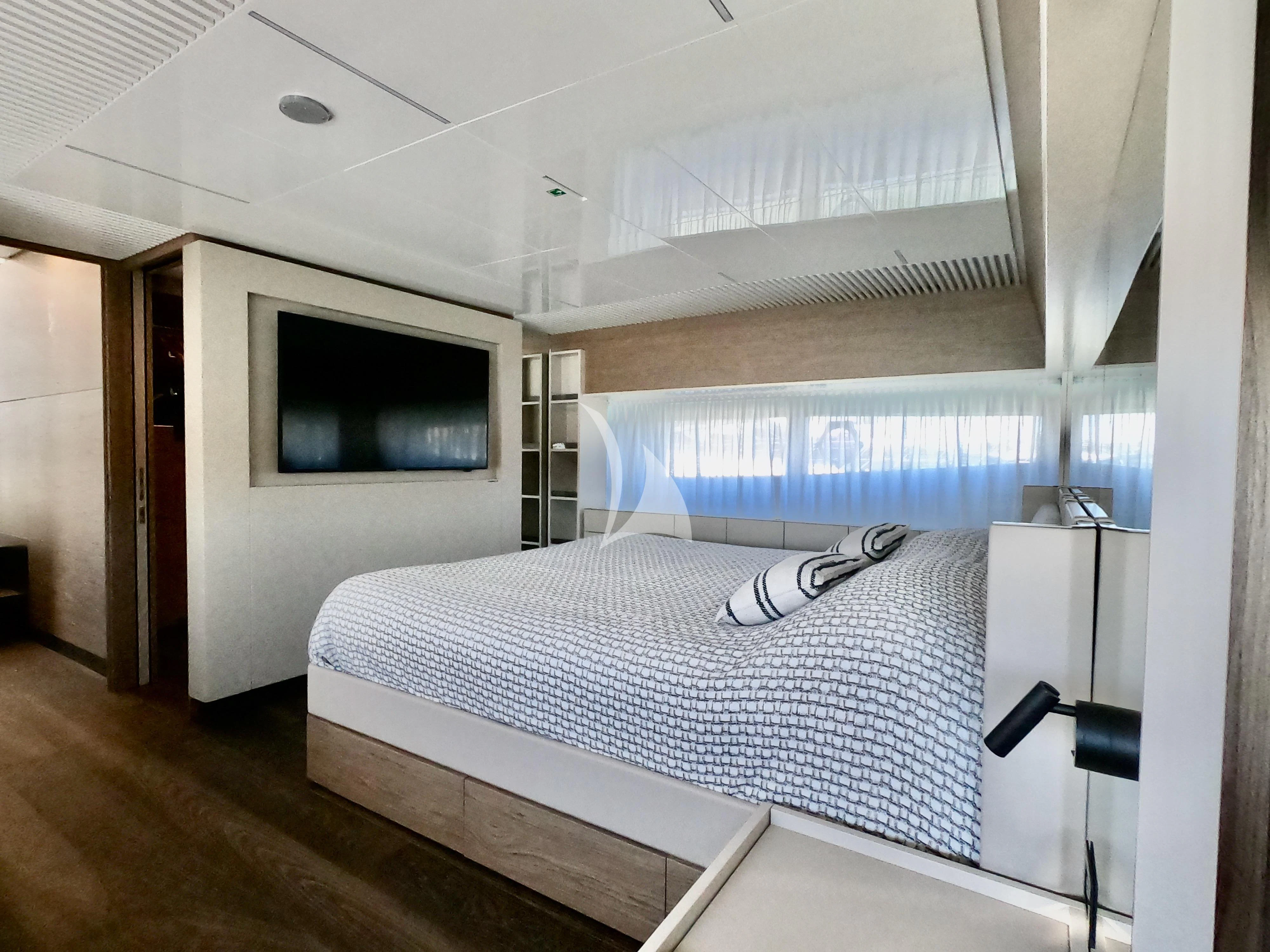 a bed in a room aboard NINETEEN Yacht for Sale