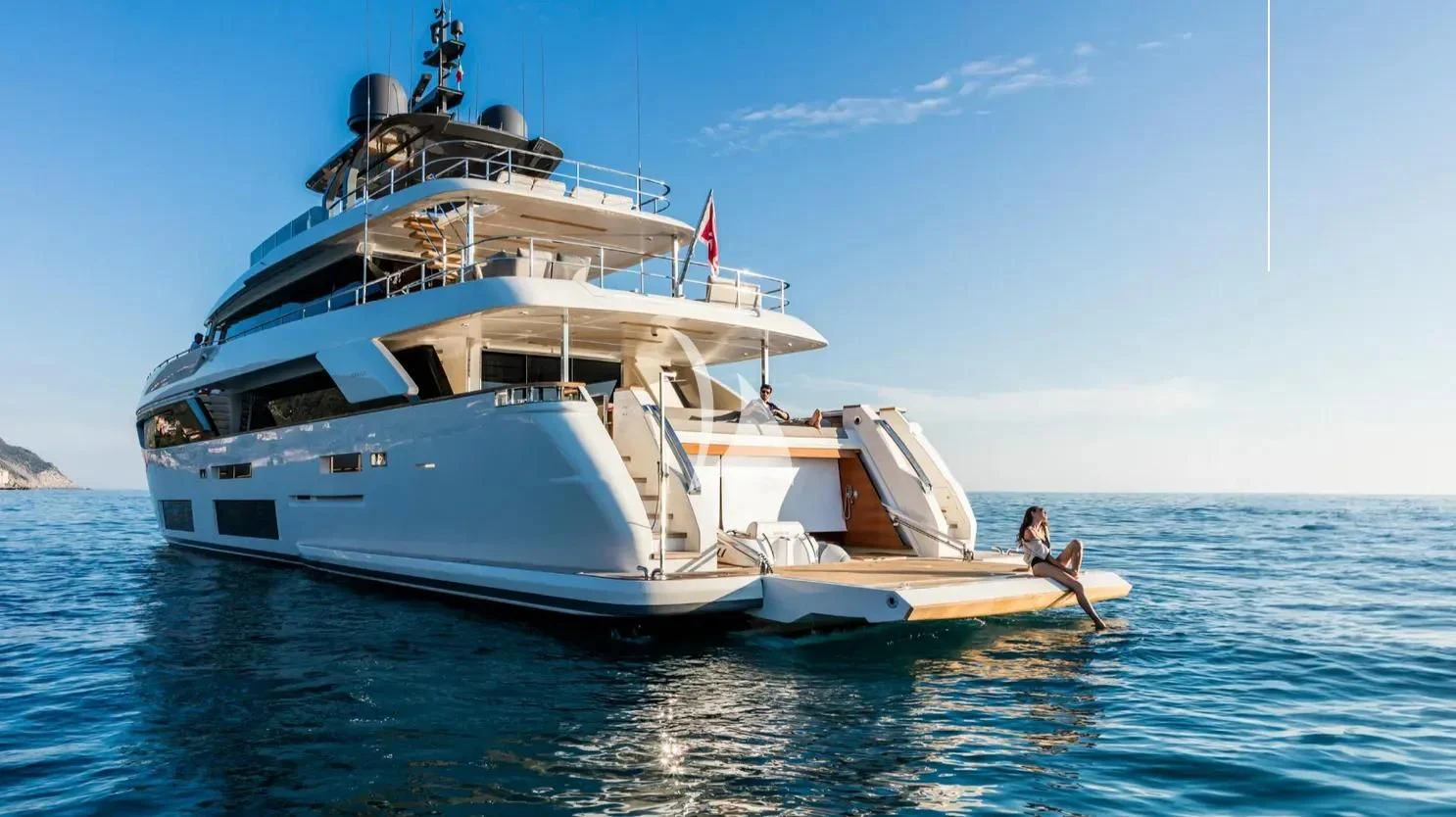 a large boat in the water aboard NINETEEN Yacht for Sale