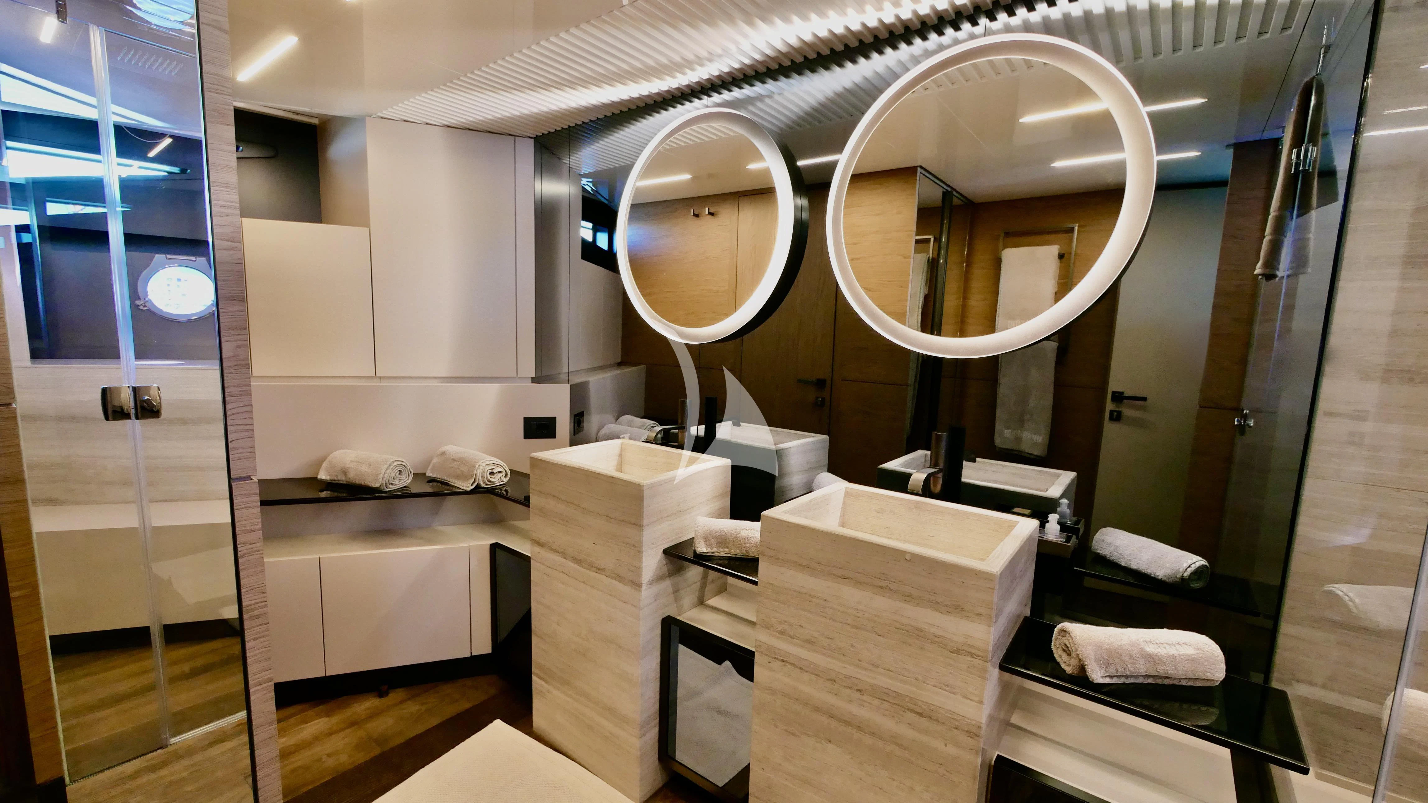 a room with a large mirror aboard NINETEEN Yacht for Sale