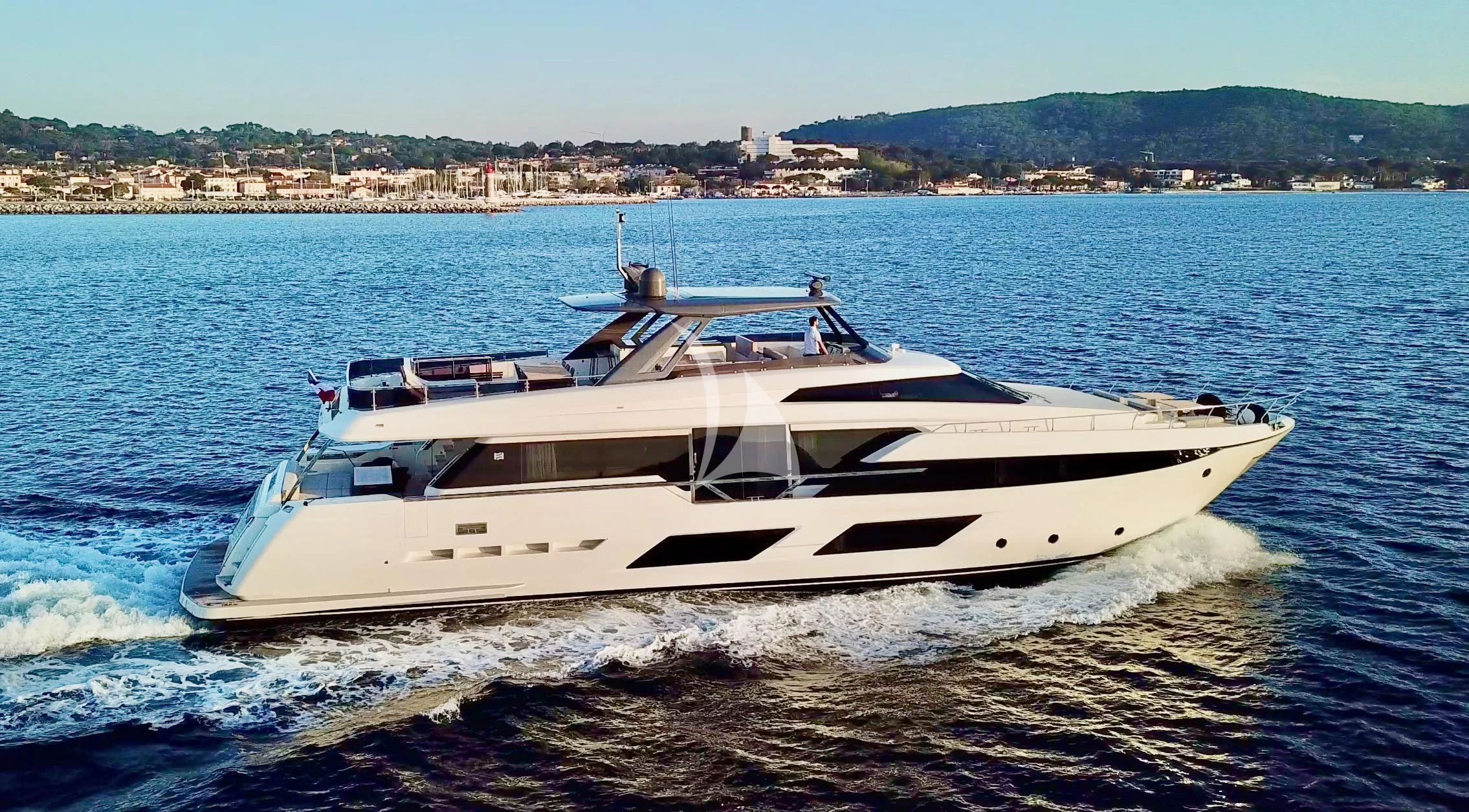 a white yacht on the water aboard NINETEEN Yacht for Sale