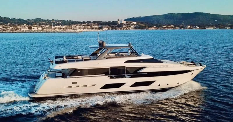 a white yacht on the beach aboard NINETEEN Yacht for Sale
