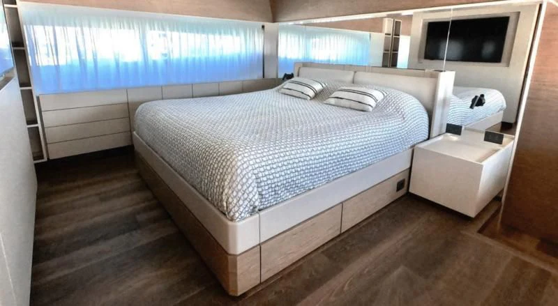 a bed in a room aboard NINETEEN Yacht for Sale