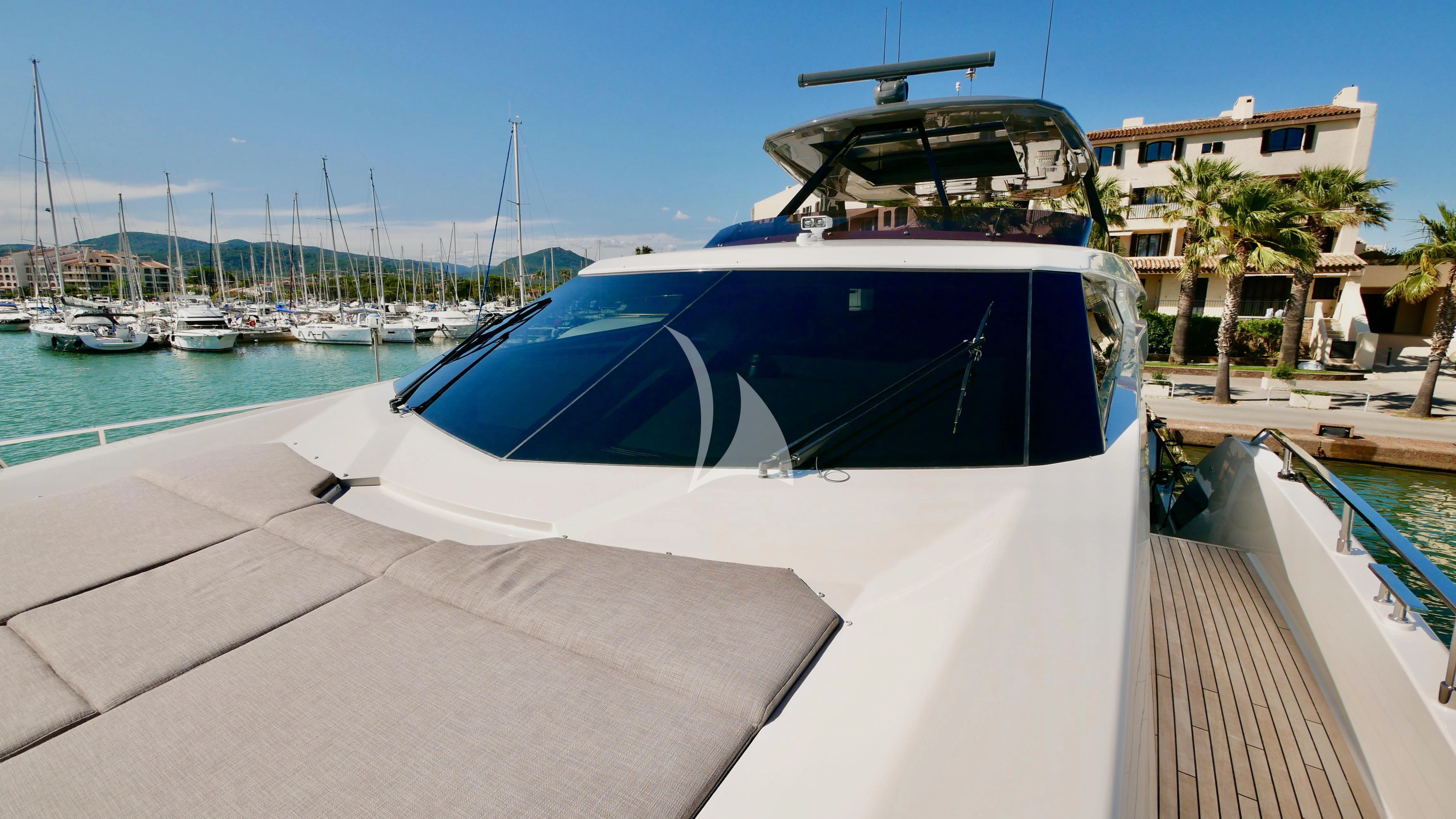 a boat docked at a pier aboard NINETEEN Yacht for Sale