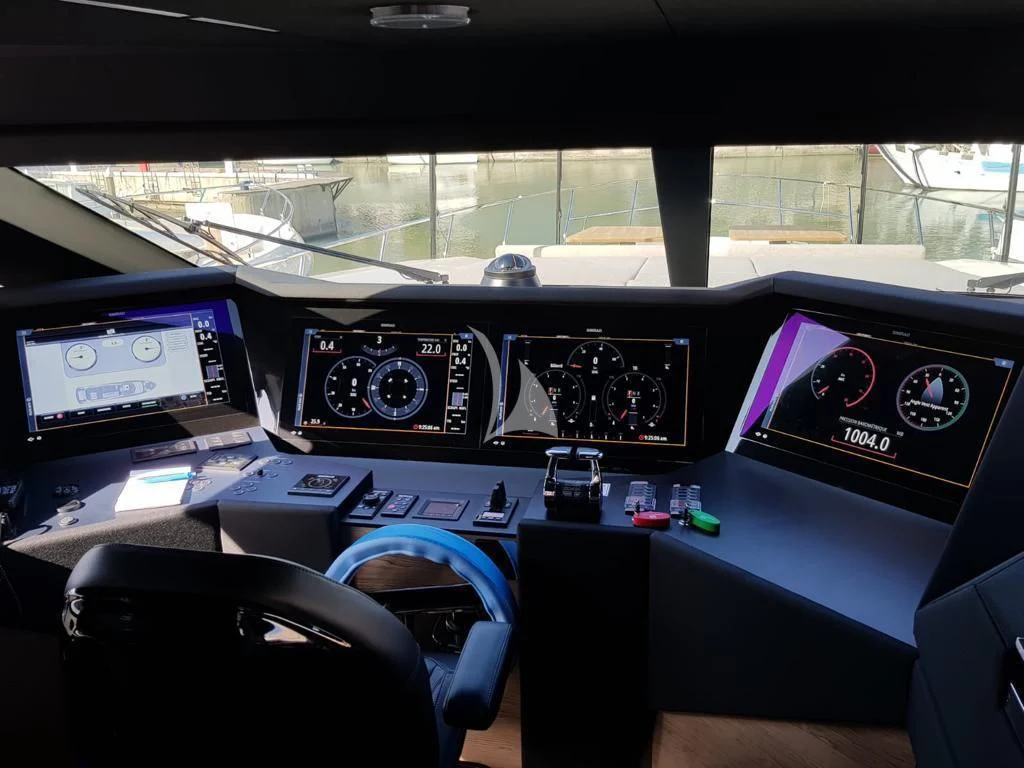 a control panel of a car aboard NINETEEN Yacht for Sale