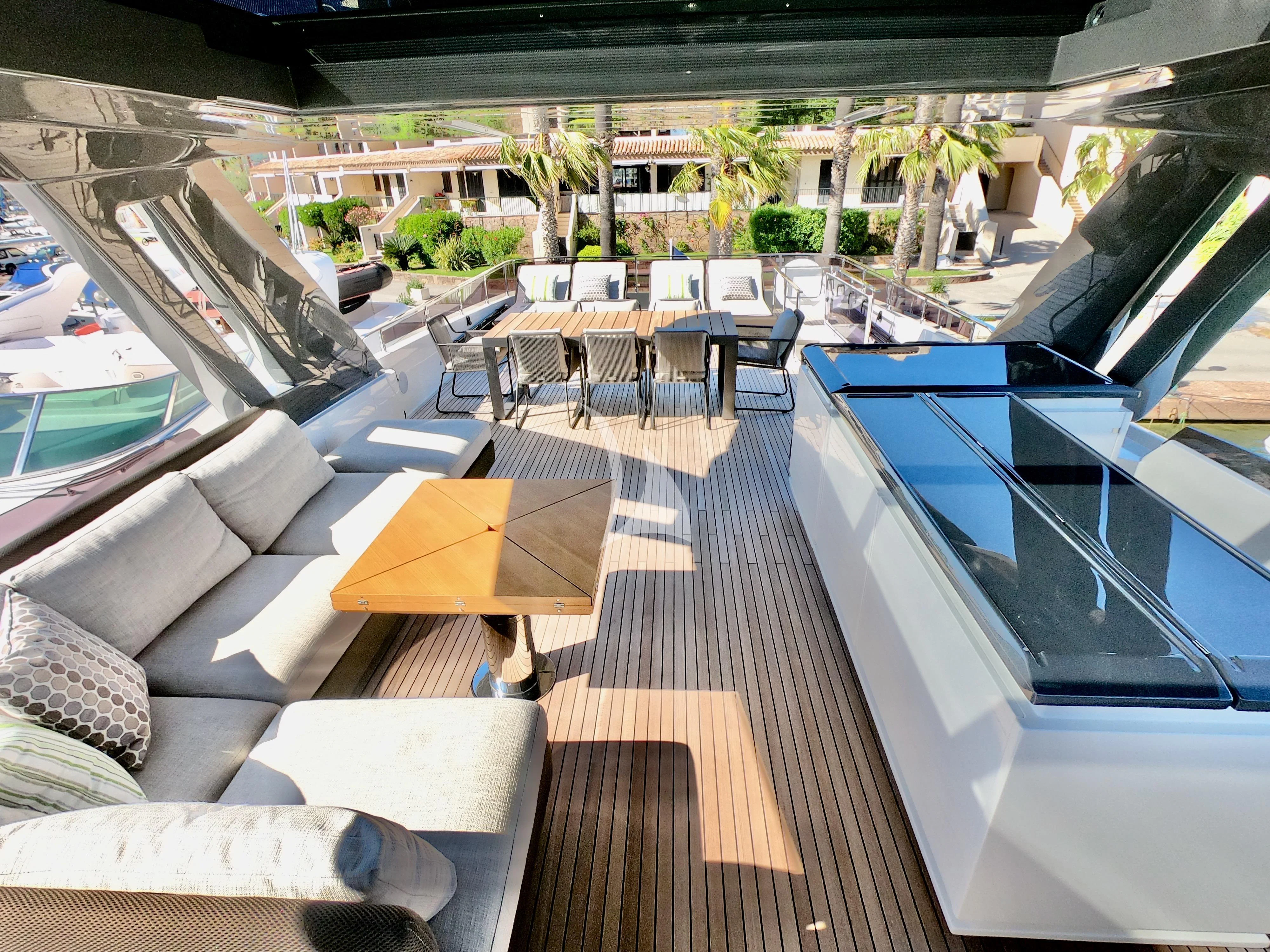a large lounge area with a pool aboard NINETEEN Yacht for Sale