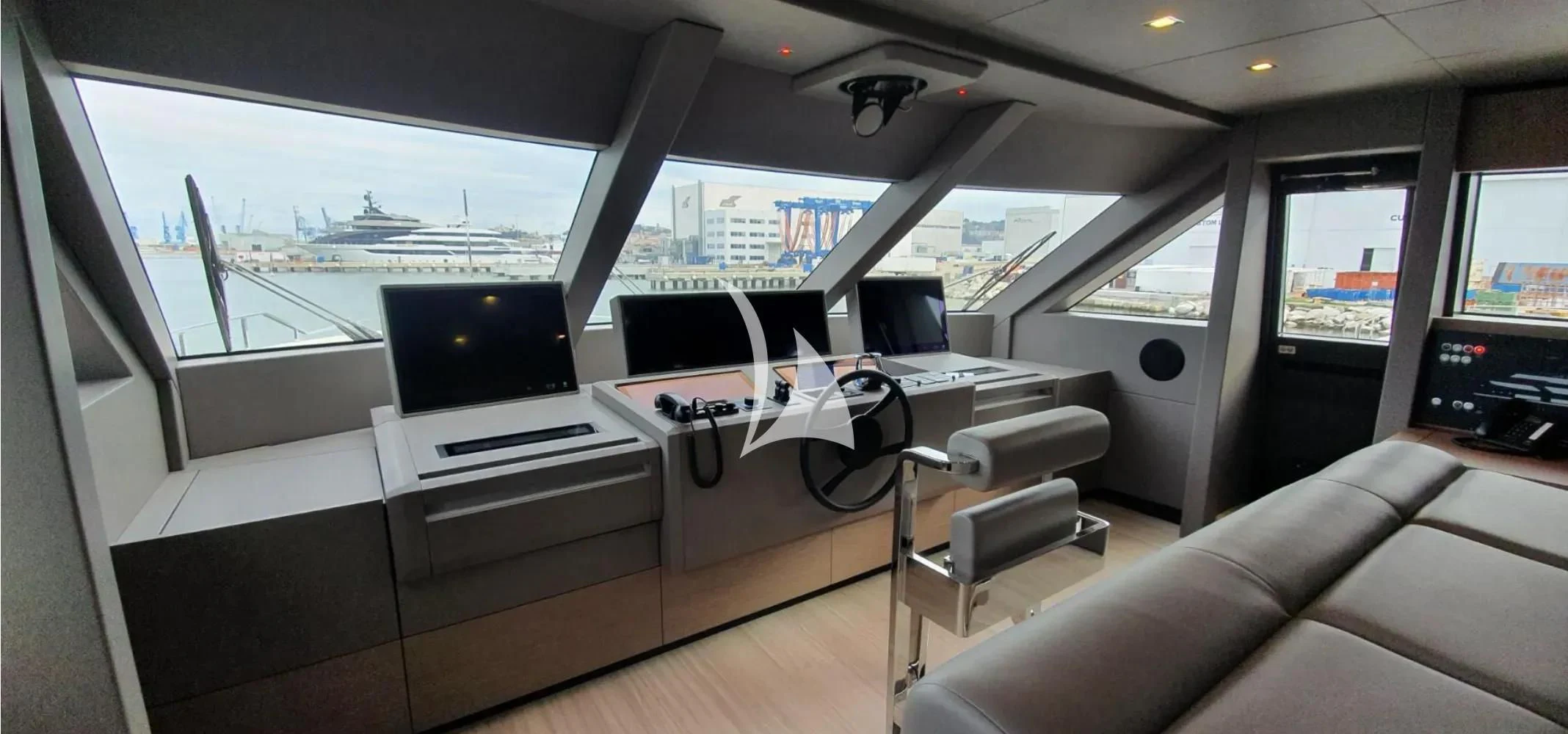 inside of a car aboard NINETEEN Yacht for Sale