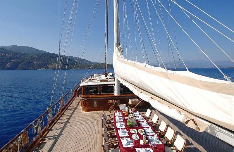 a boat docked at a pier aboard MARE NOSTRUM Yacht for Sale