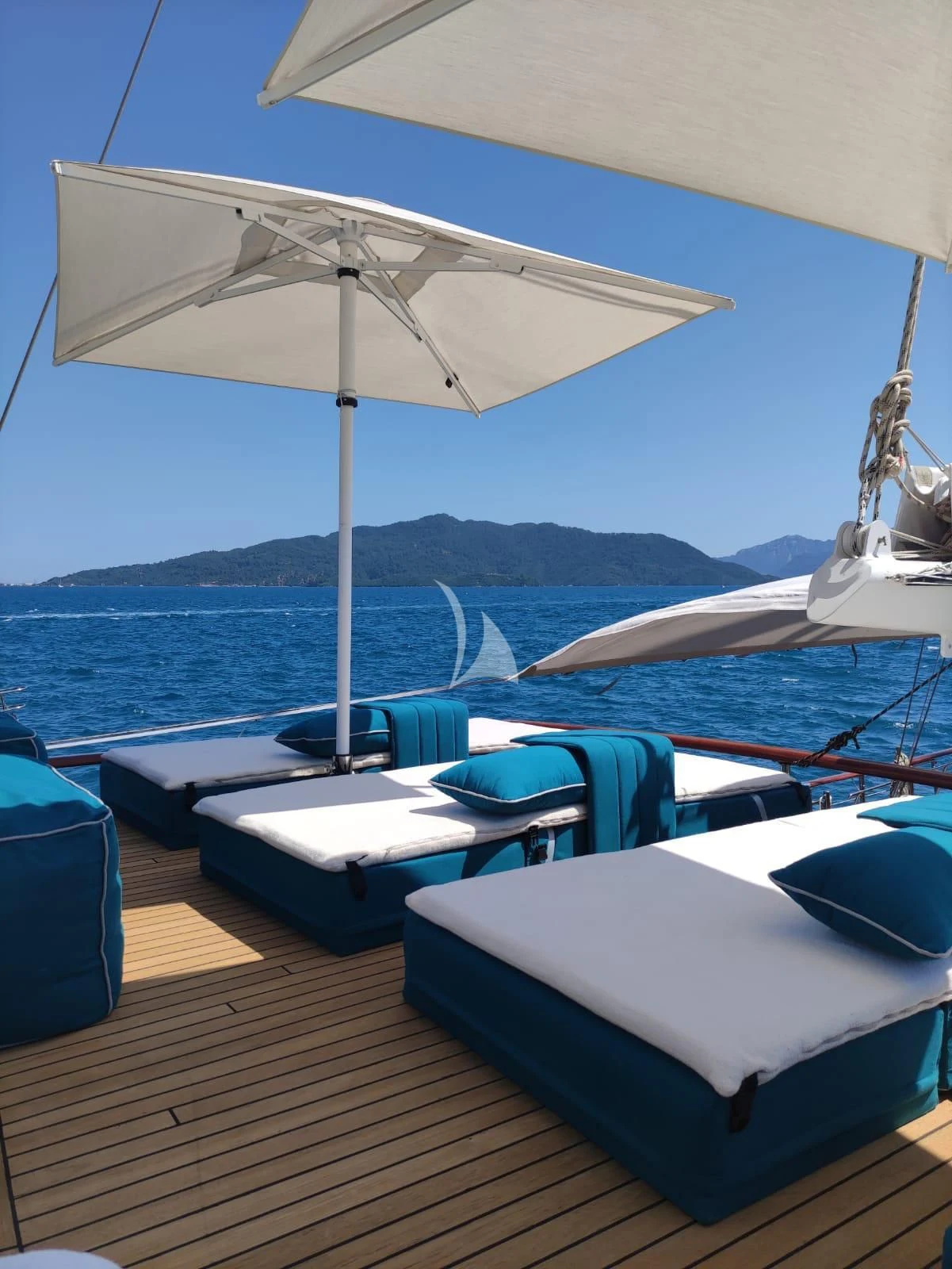 a boat with a white umbrella aboard MARE NOSTRUM Yacht for Sale