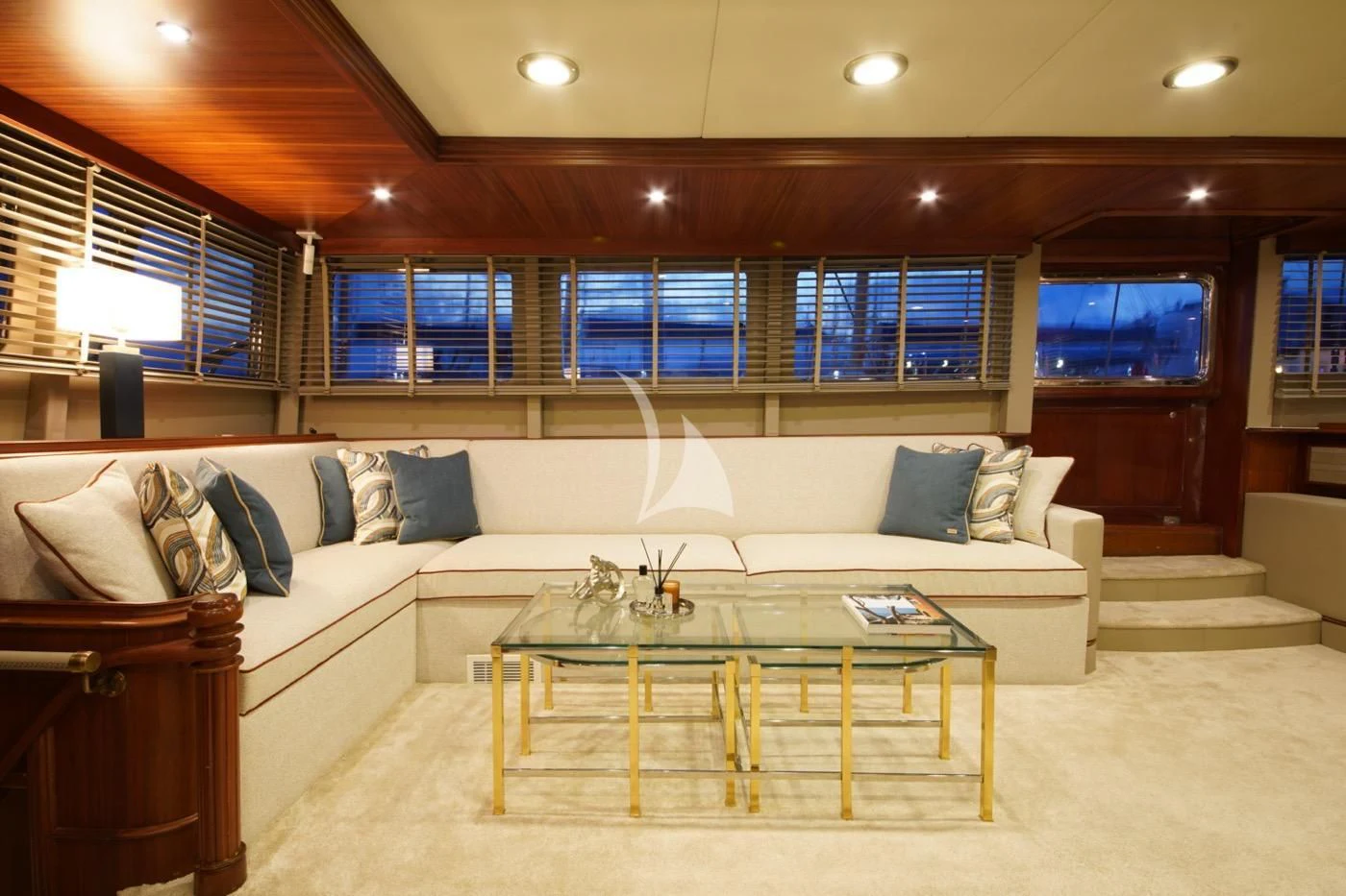 a living room with a couch and a table aboard MARE NOSTRUM Yacht for Sale