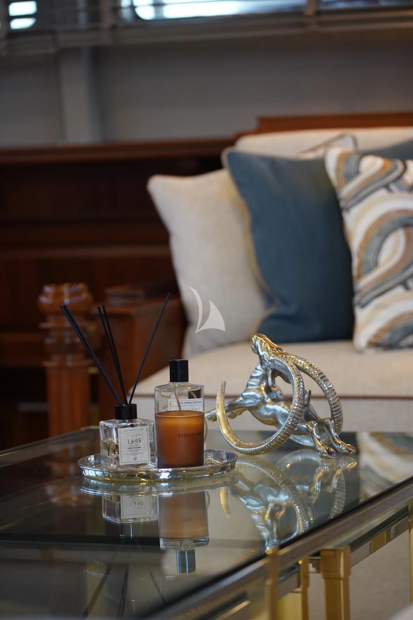 a glass of beer on a table aboard MARE NOSTRUM Yacht for Sale