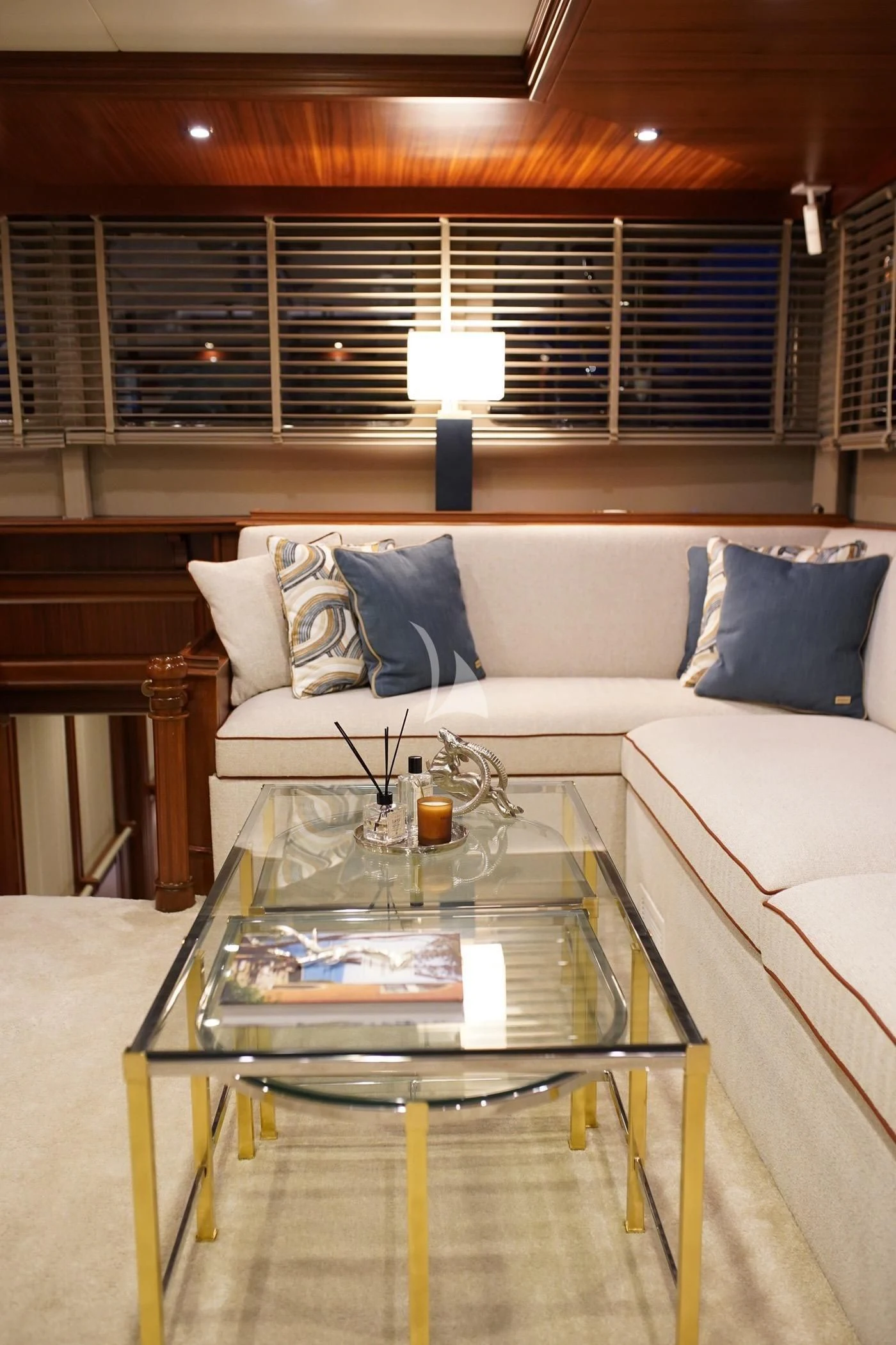 a living room with a couch and a table aboard MARE NOSTRUM Yacht for Sale