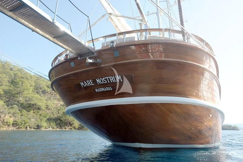 a large wooden boat on the water aboard MARE NOSTRUM Yacht for Sale