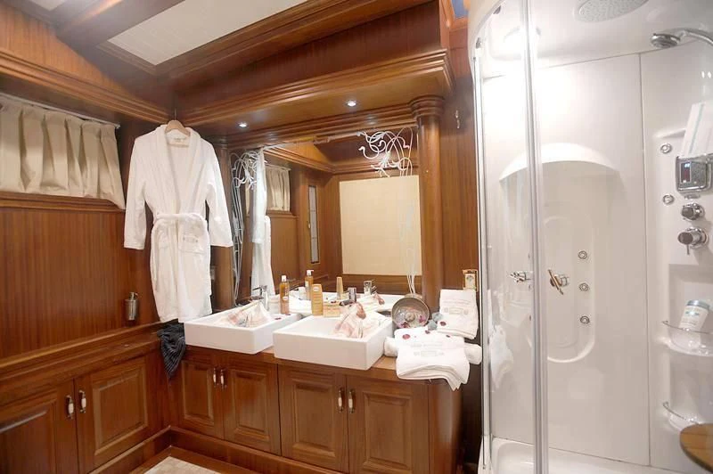 a bathroom with a shower and sink aboard MARE NOSTRUM Yacht for Sale