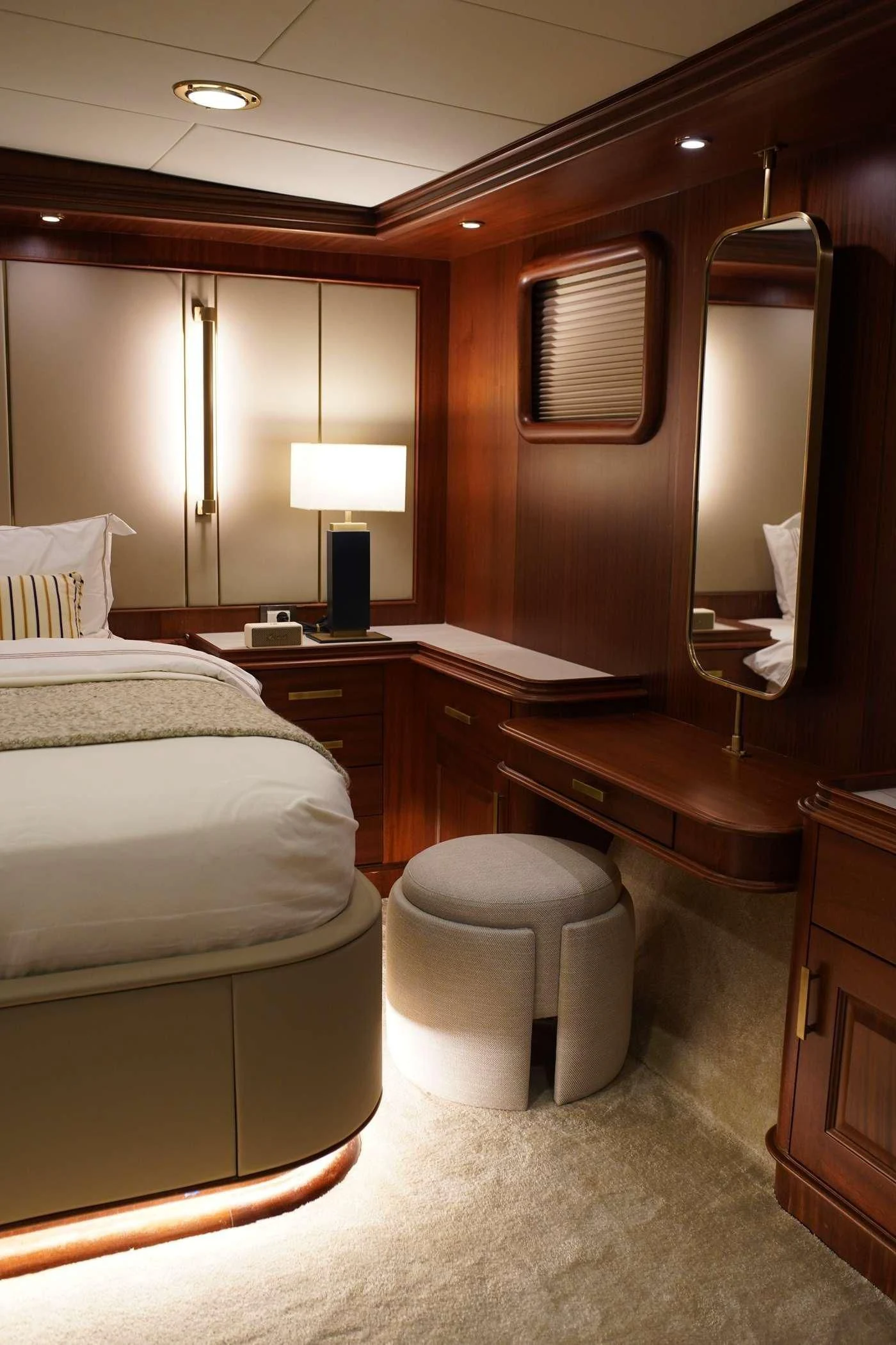 a hotel room with a bed and a desk aboard MARE NOSTRUM Yacht for Sale