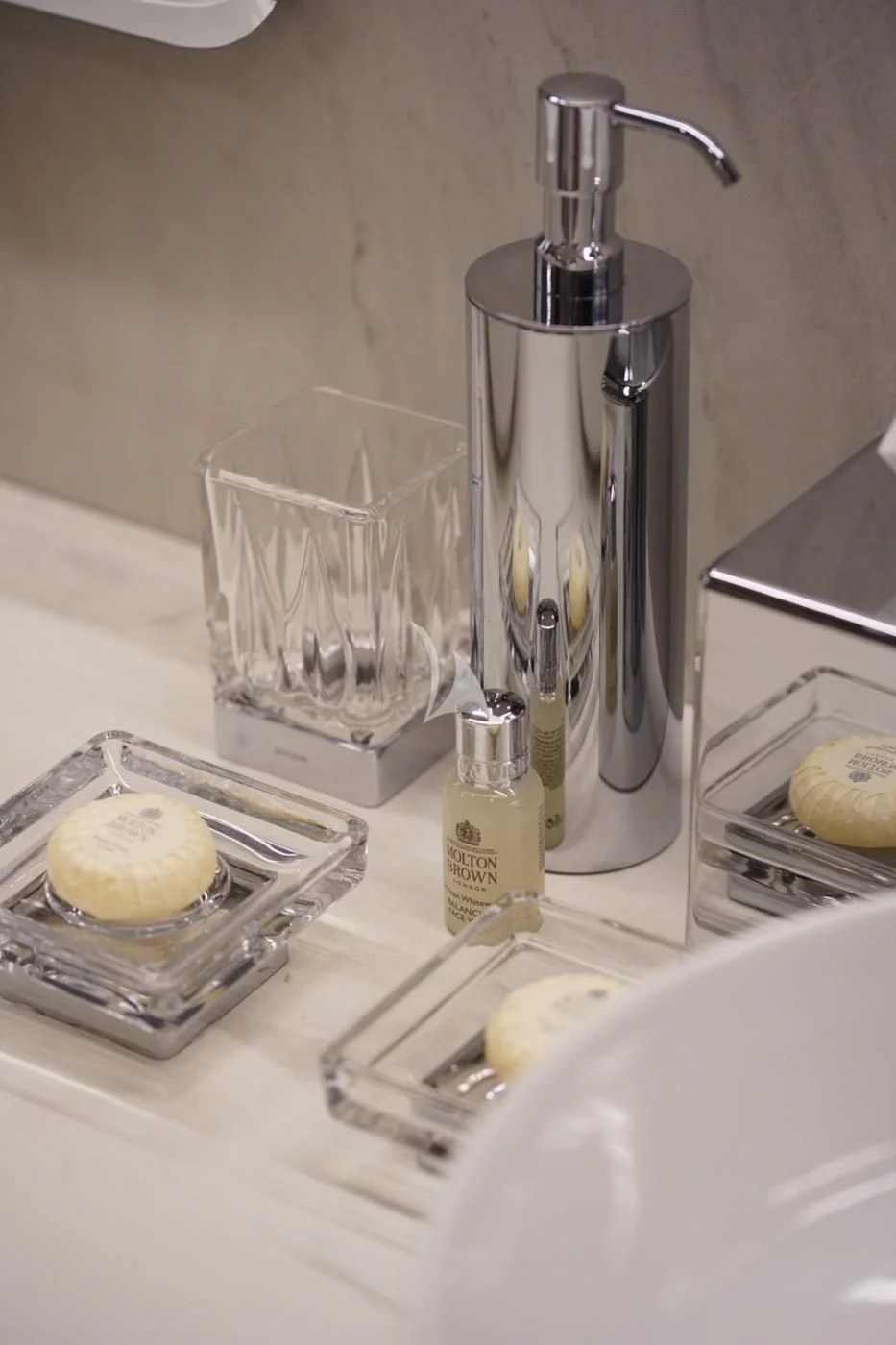 a kitchen counter with a stainless steel faucet and a bowl of fruit aboard MARE NOSTRUM Yacht for Sale
