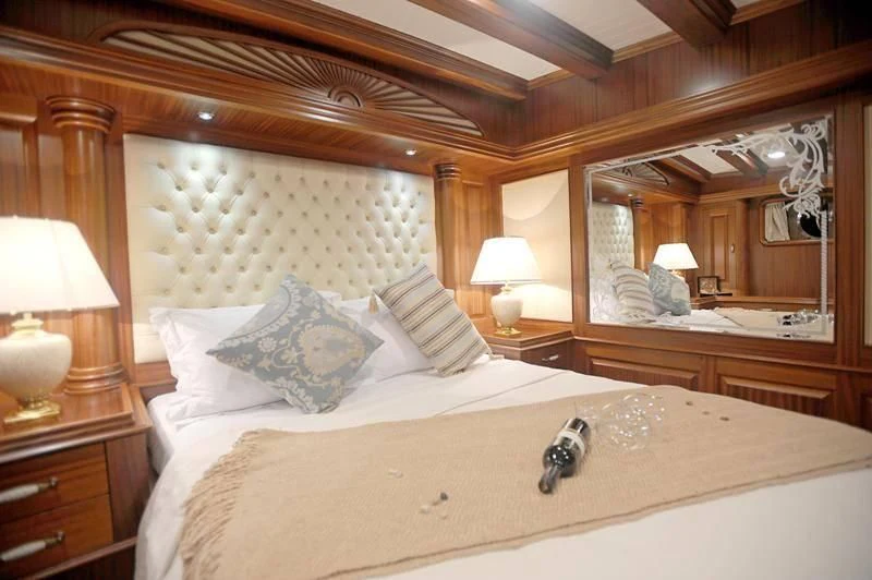 a large bed with a large mirror above it aboard MARE NOSTRUM Yacht for Sale