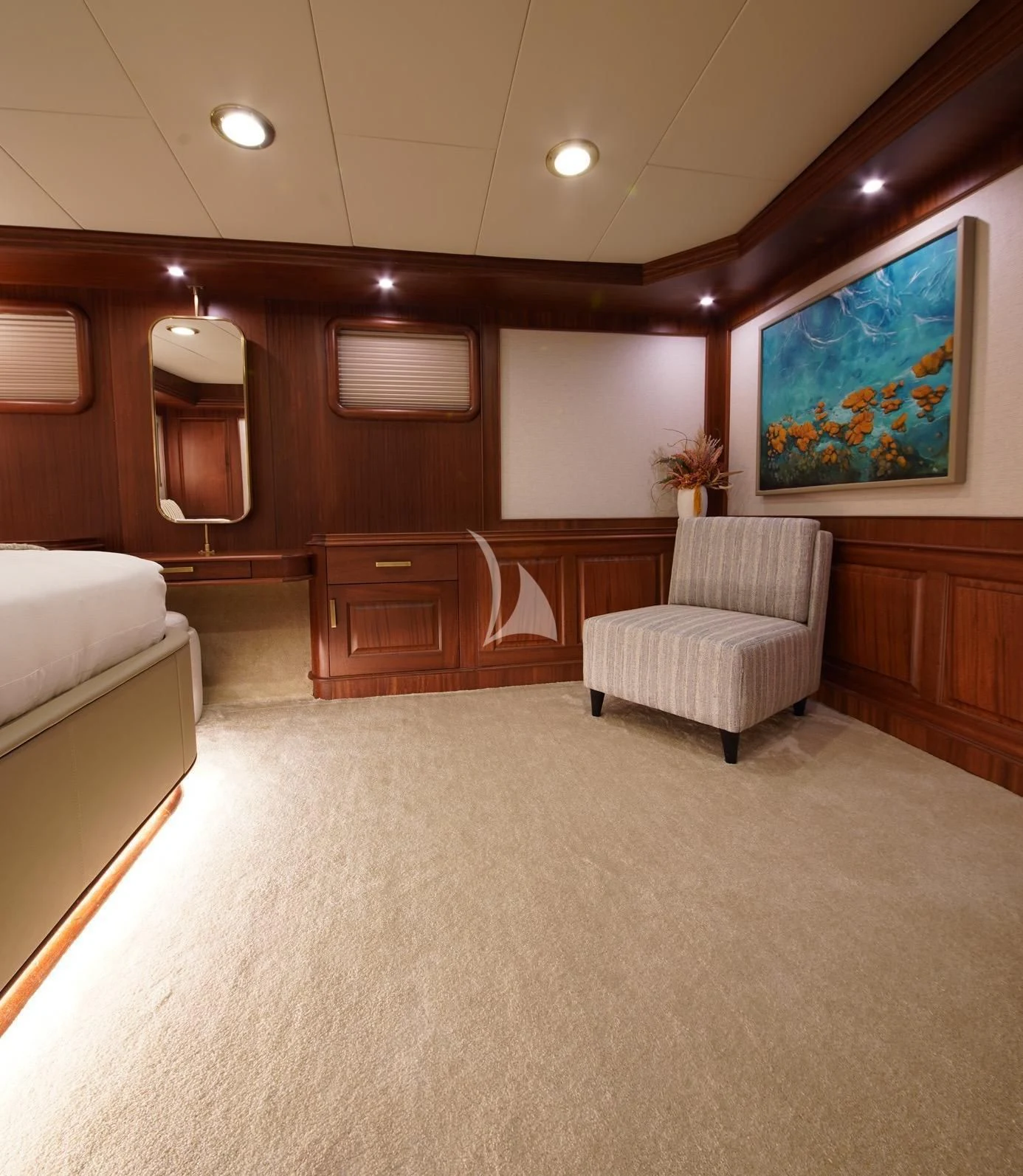 a room with a couch and a table aboard MARE NOSTRUM Yacht for Sale