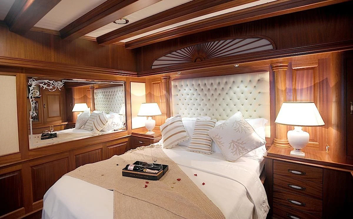 a hotel room with two beds aboard MARE NOSTRUM Yacht for Sale