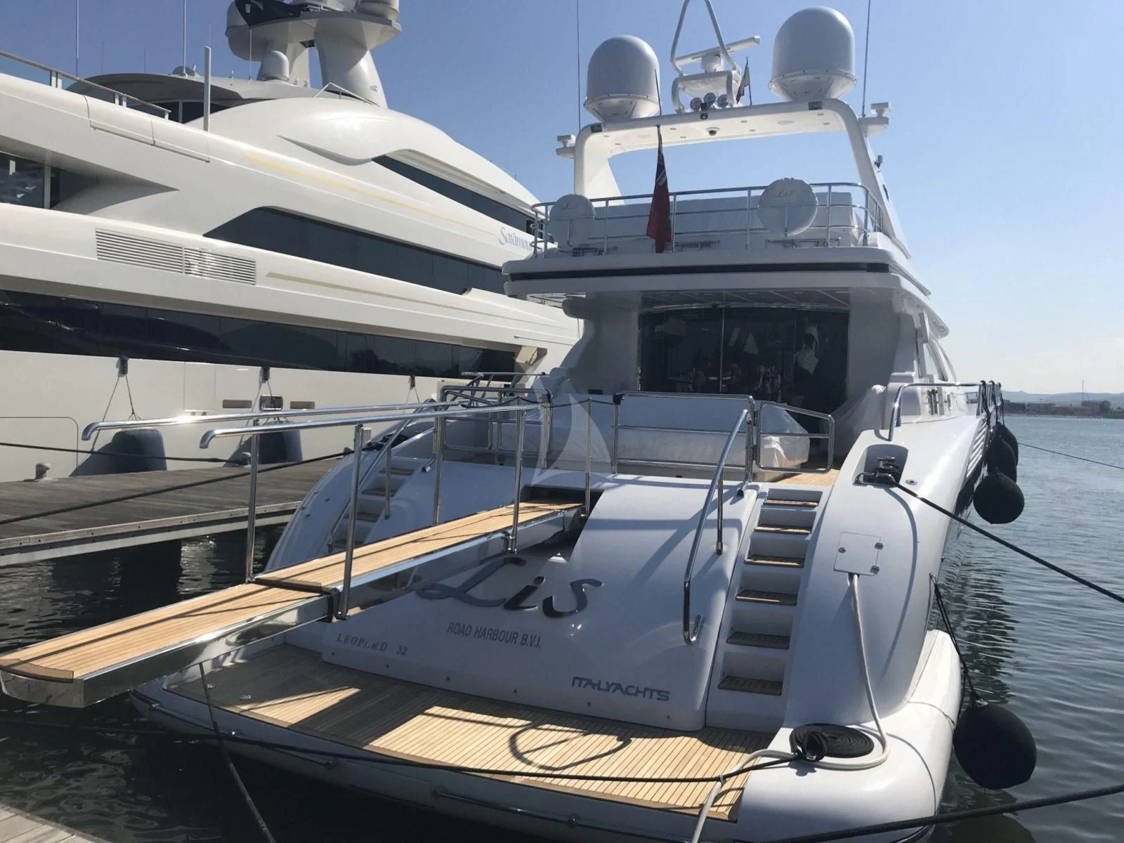 a boat docked at a pier aboard ATHOS Yacht for Sale