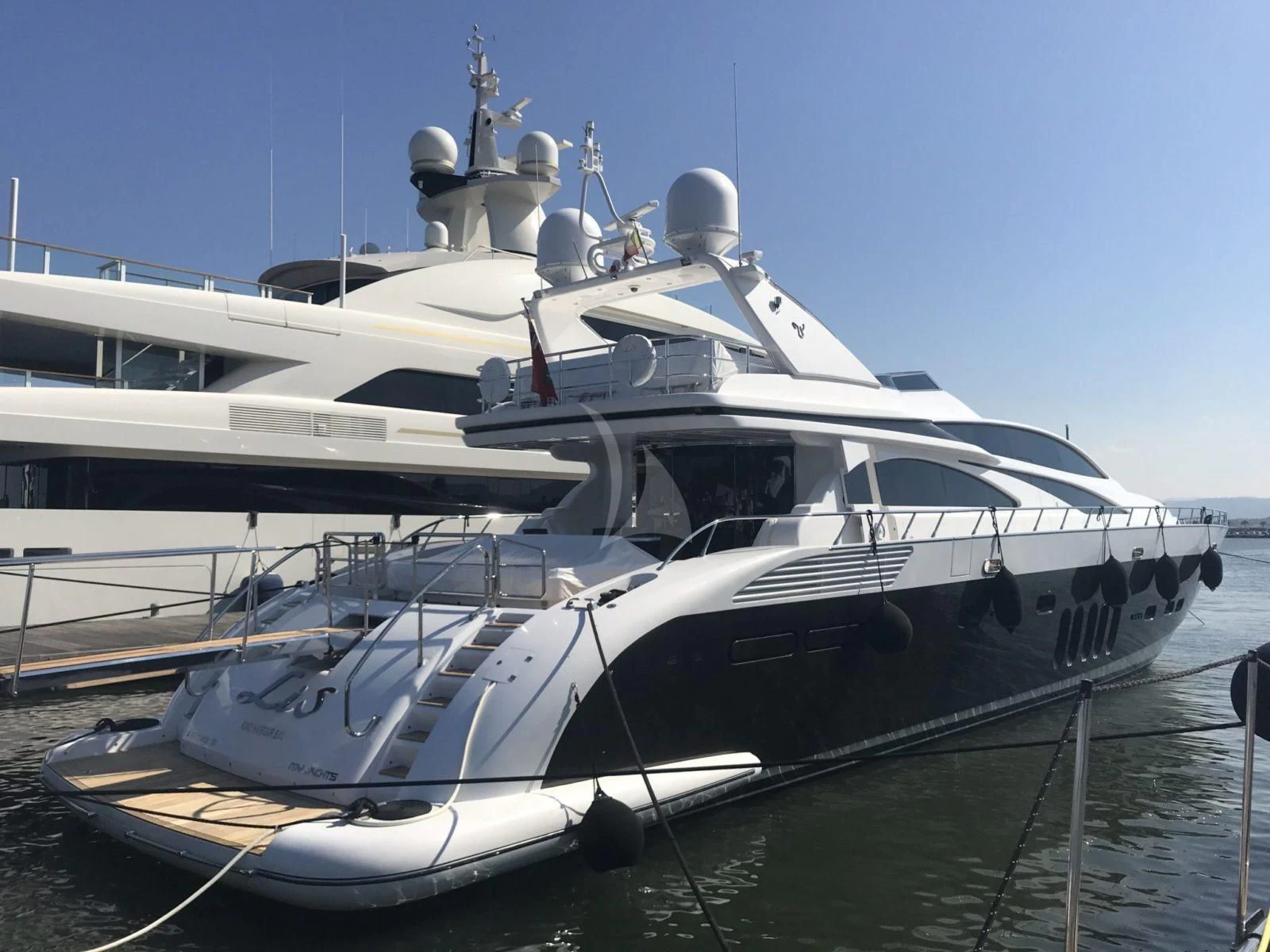 a boat docked at a pier aboard ATHOS Yacht for Sale