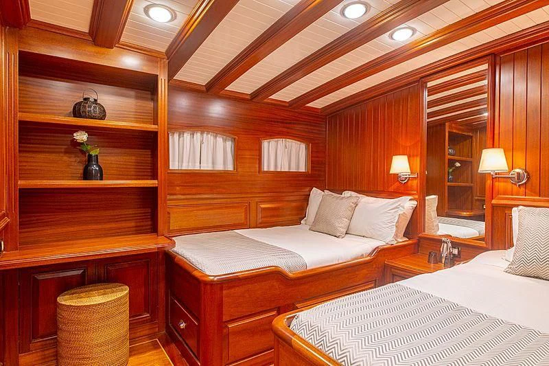 a room with two beds aboard HIC SALTA Yacht for Sale