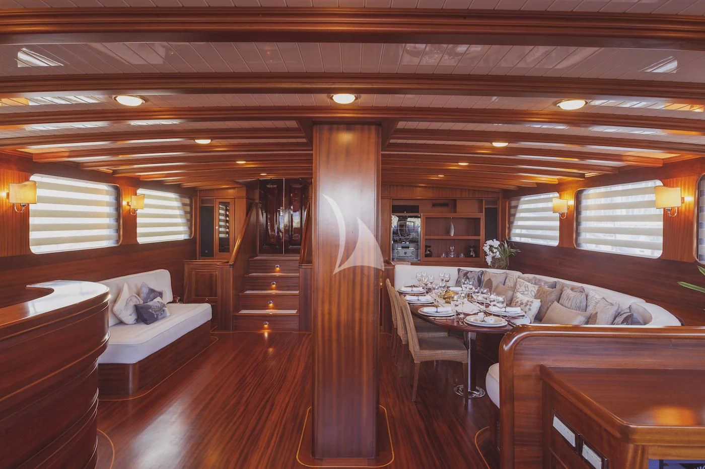 a large living room with wood floors aboard HIC SALTA Yacht for Sale