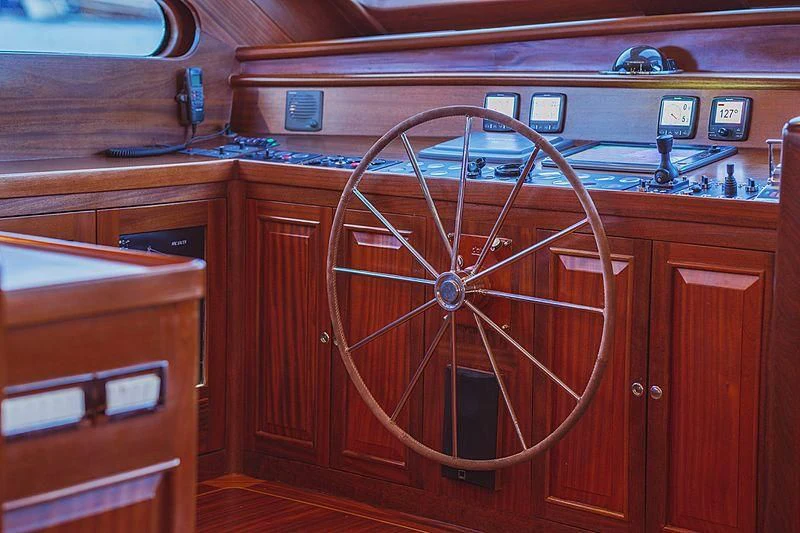 a wooden cabinet with a fan aboard HIC SALTA Yacht for Sale
