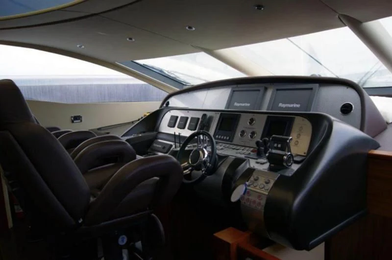 the inside of a car aboard CODE Yacht for Sale